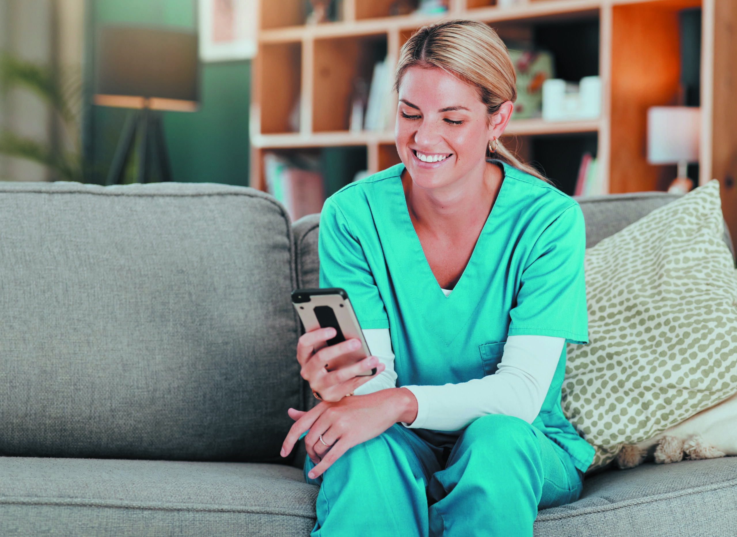 Nurse,,phone,and,happy,with,social,media,,post,or,funny