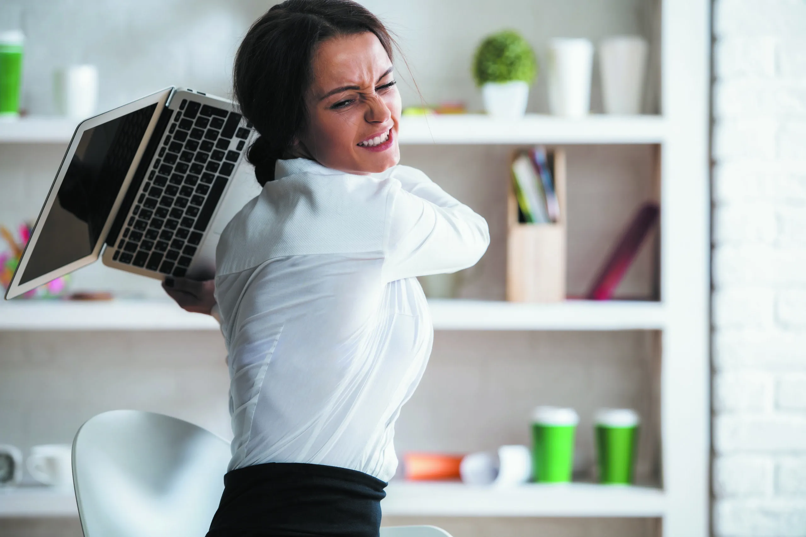 Portrait,of,furious,young,woman,about,to,throw,and,break