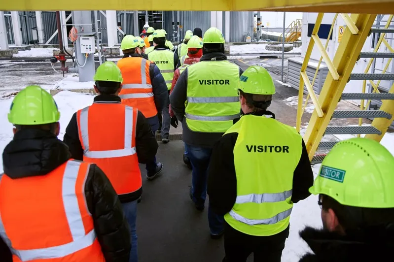 Visitors Going Onsite with high viz jackets